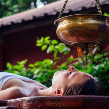 ayurveda massage alternative healing therapy.beautiful caucasian female getting