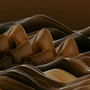 a brown and black background with wavy lines